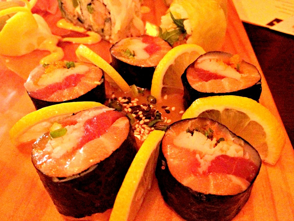 Sashimi Roll: Tuna, salmon, whitefish, crab, smelt roe, scallion, rolled in seaweed, served with sweet miso sauce