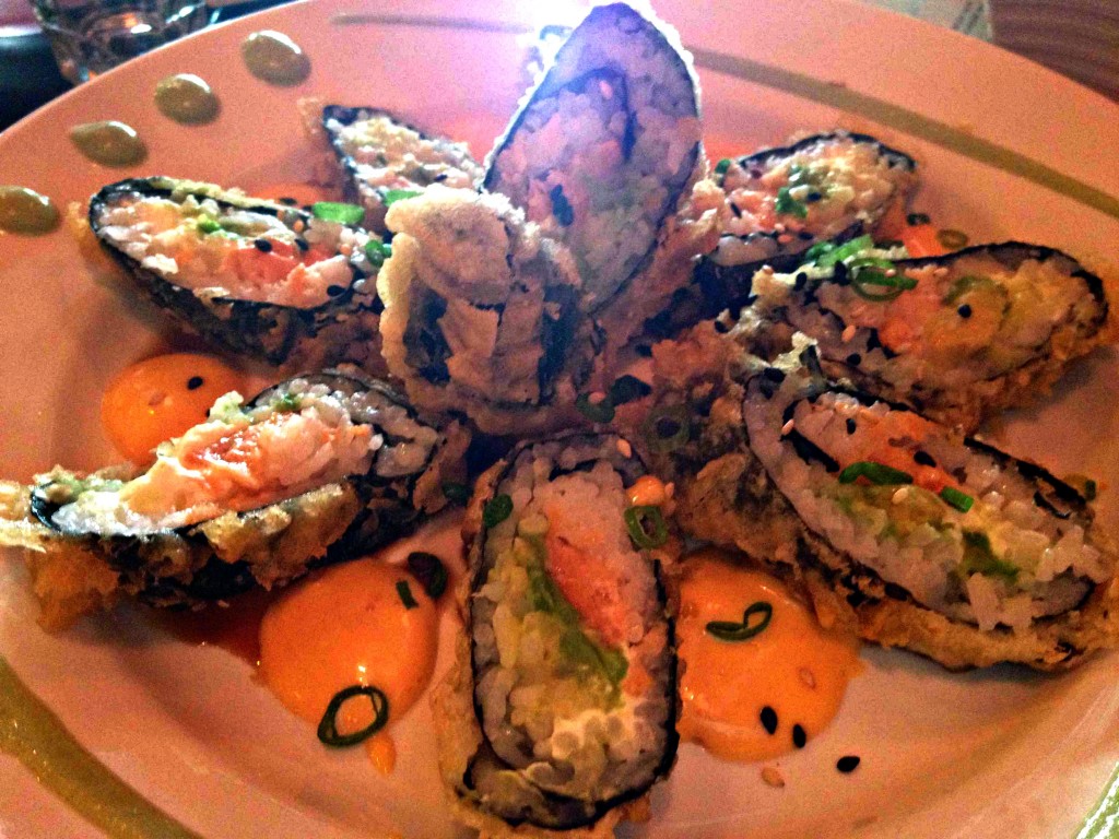 Tempura Bagel Roll: Smoked salmon, cream cheese, avocado and scallion, wrapped in seaweed and rice, served tempura style with eel sauce and spicy mayo