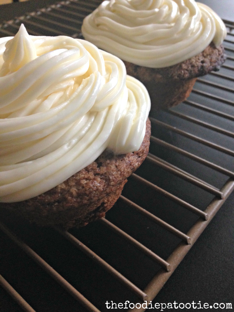 Carrot Cake Cupcakes via TheFoodiePatootie.com | #dessert #cake #cupcakes #recipe #foodholiday #foodcalendar