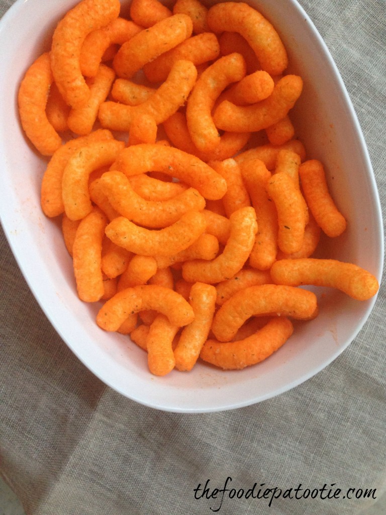 Ghost Pepper Cheese Doodles via TheFoodiePatootie.com | #snack #cheesedoodle #recipe #foodholiday