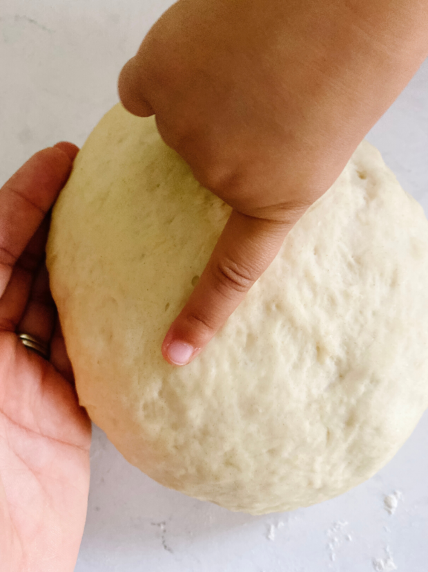 kids baking pizza dough